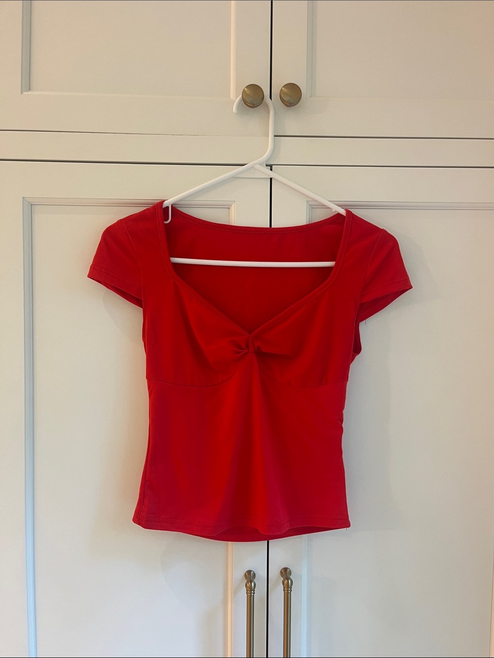 Red top with cinch in the middle